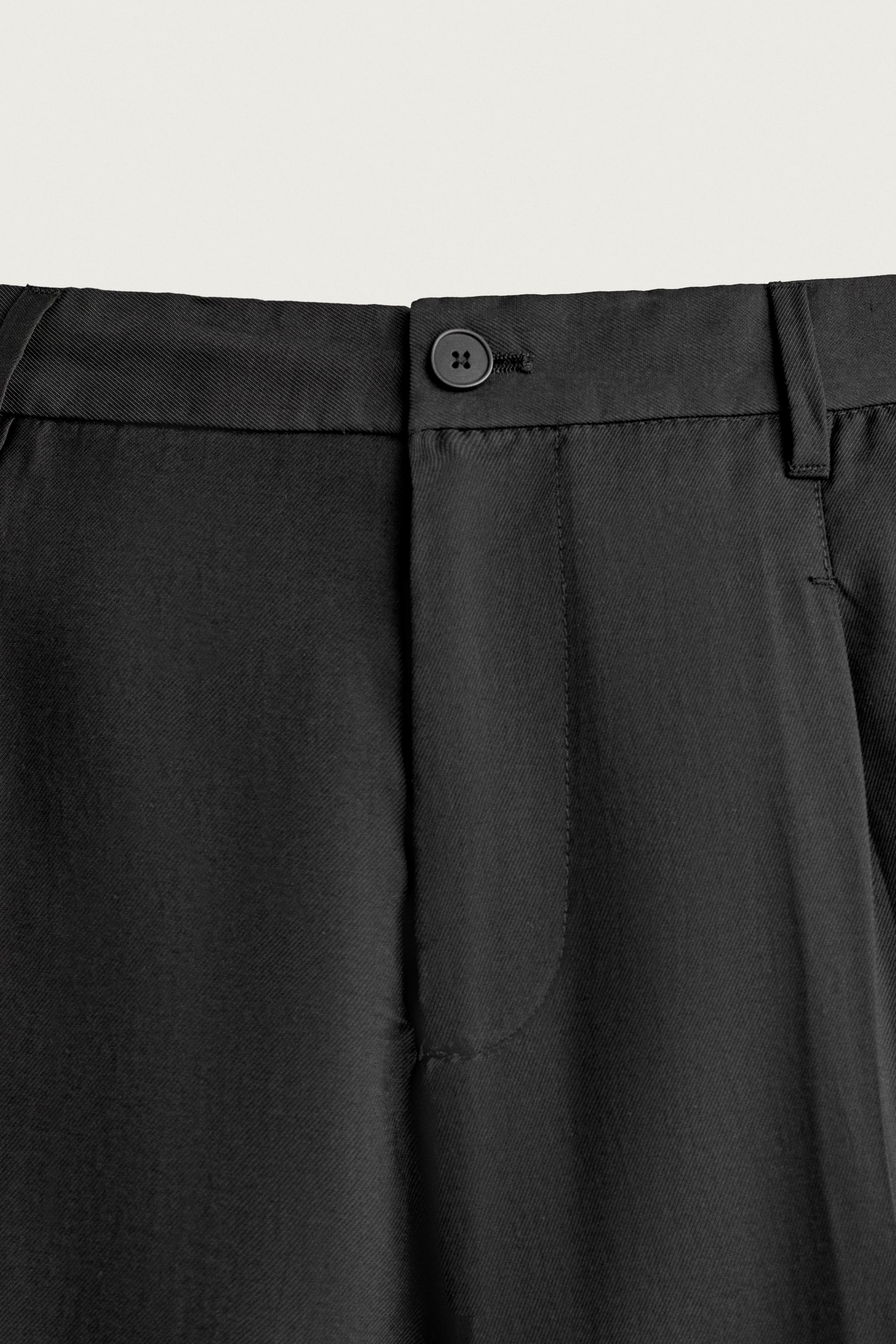 PLEATED FLOWY TROUSERS